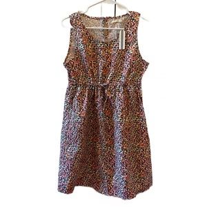 Tulle brand retro dress, geometric pattern in Fall colors.